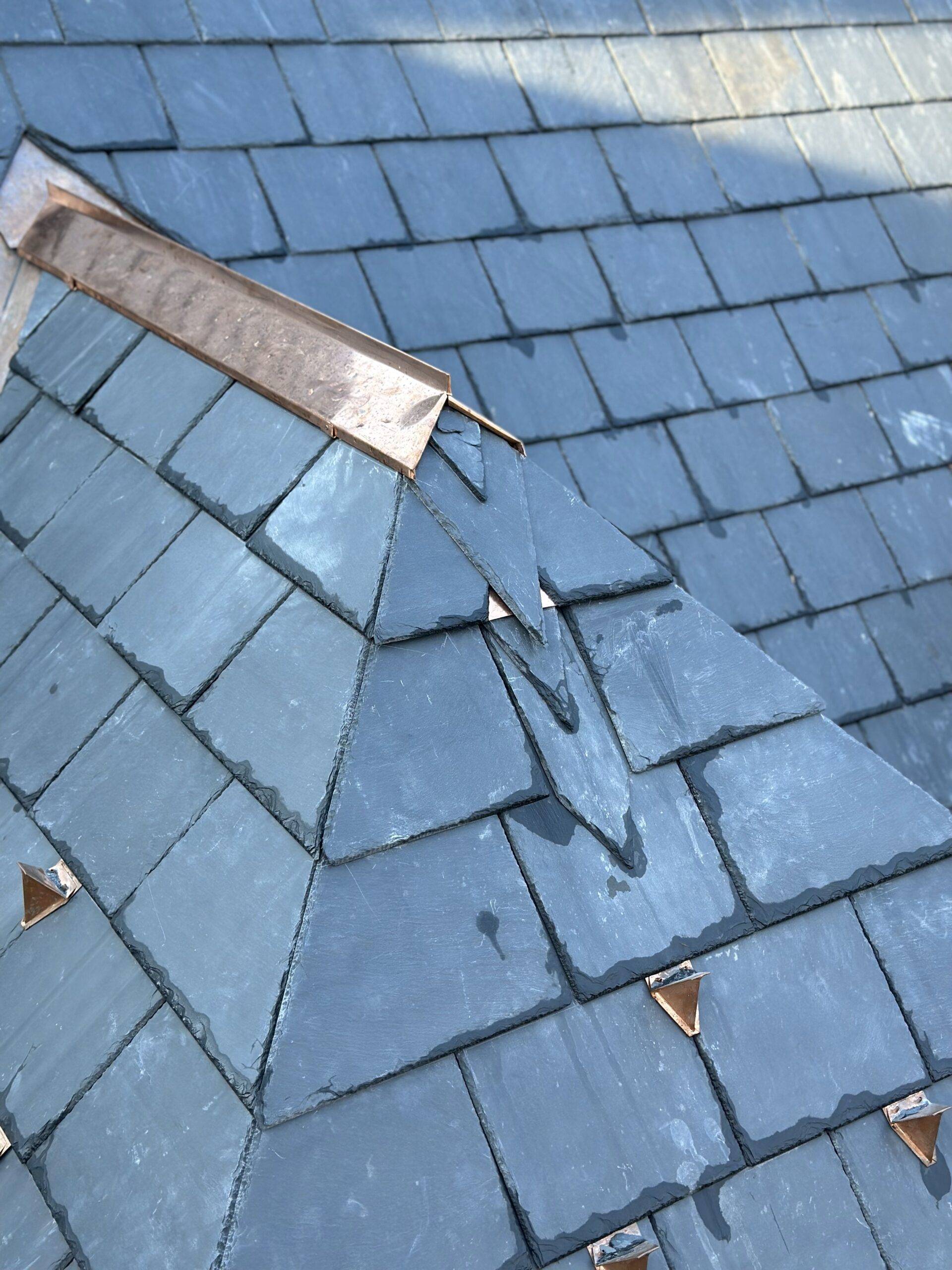 77 Baby point natural slate tiles with copper installation