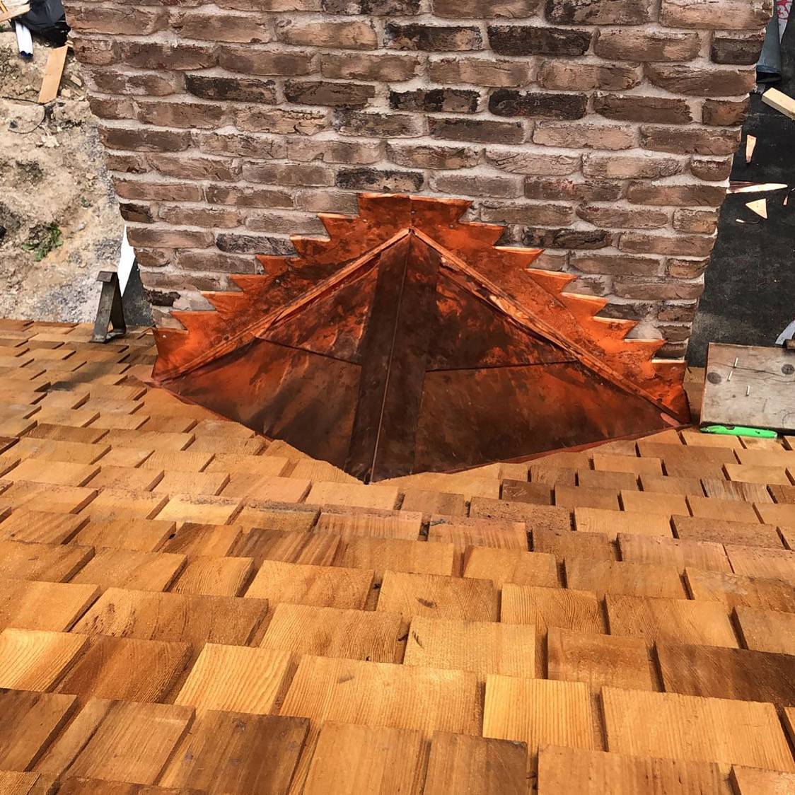 Copper Saddle Cricket and Tapersawn Cedar Roof