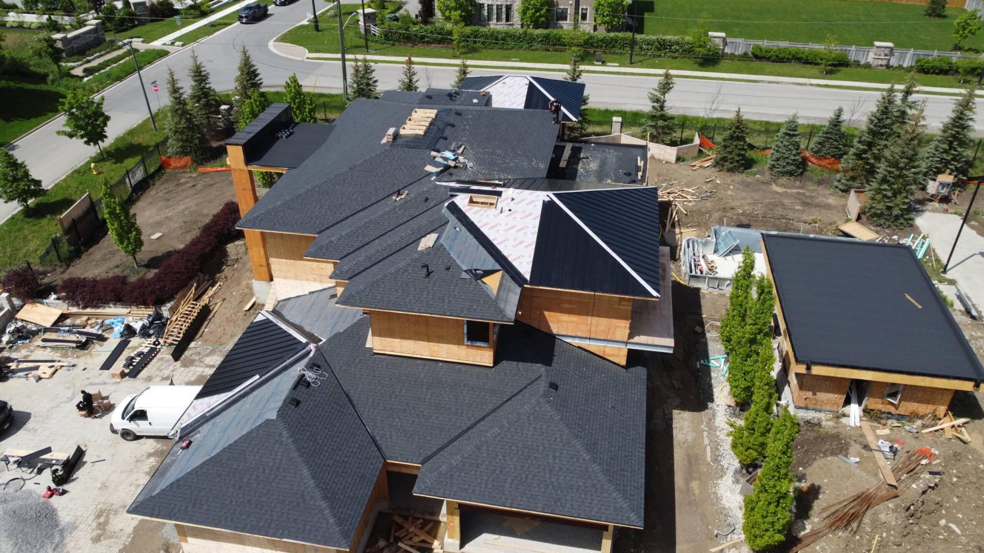Day Custom Homes -- Fine Lines Design Roof Installation
