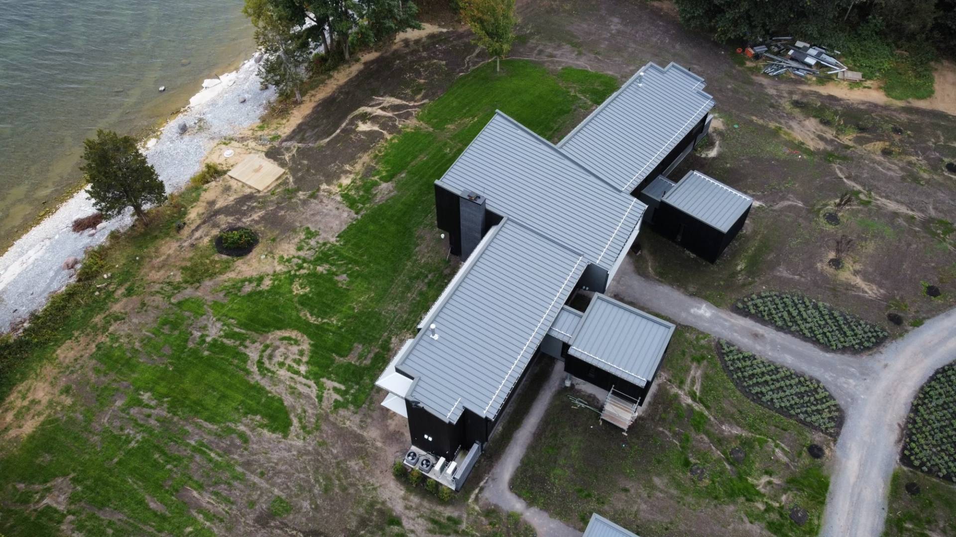 aerial view of Howes lane AR-50 2” Upturn Standing Seam Roof