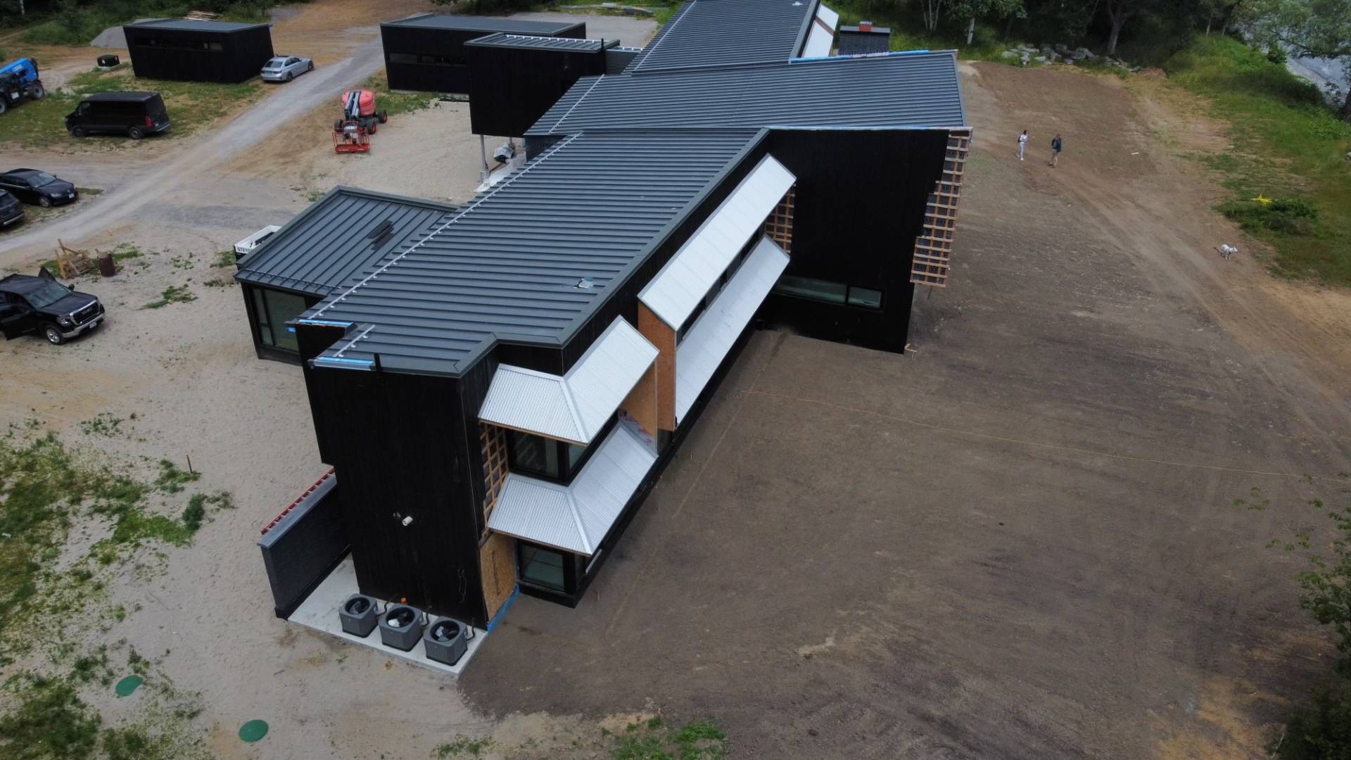 7/8” Corrugated & Optimum Rib Roof Installation with 7/8” Corrugated Siding installation on skirt roof sections